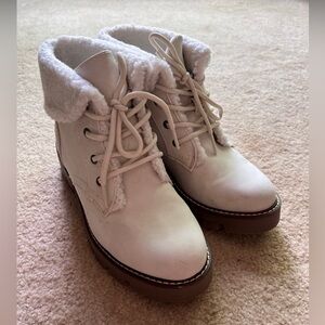 White faux fur and leather boots